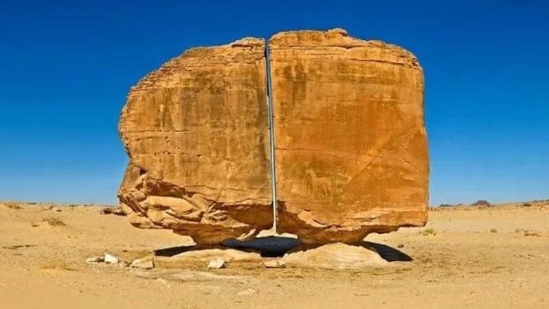 'Video thumbnail for The 4,000-year-old Al Naslaa Rock Formation Has A Mystery Laser-like Cut Through Its Center - History & Travel'