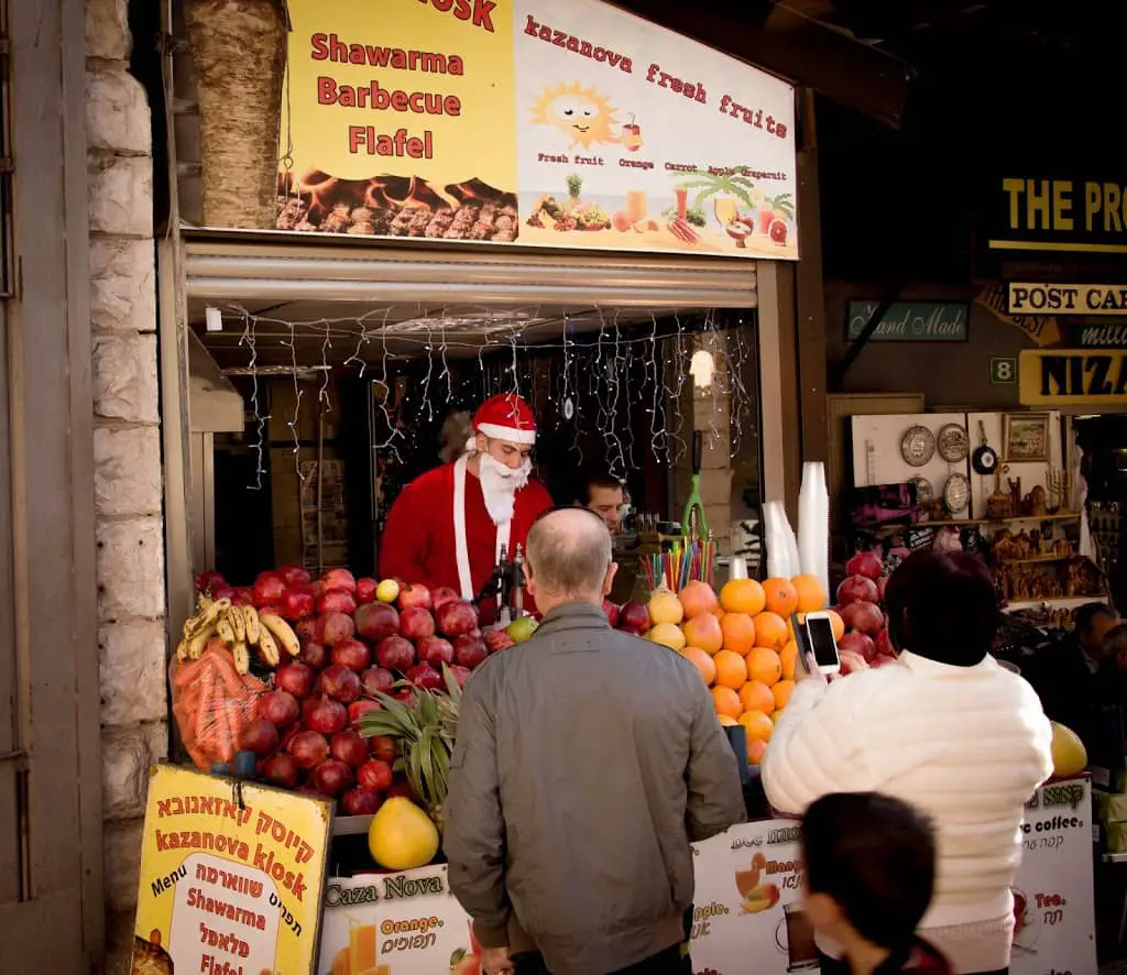 Santa preparing orange juice in Nazareth