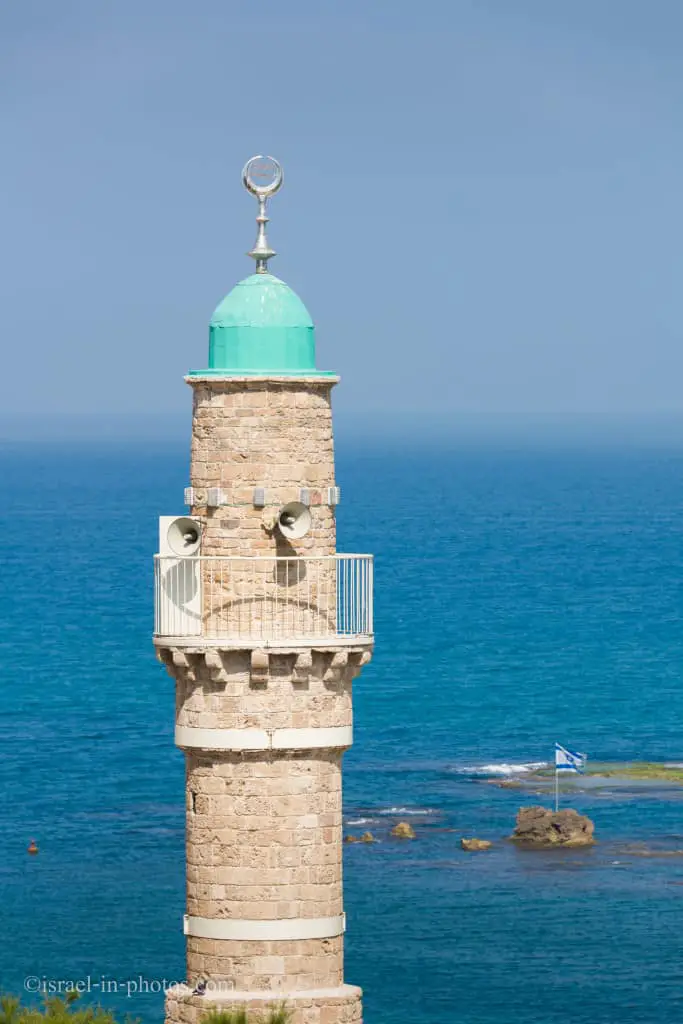 The top of Al-Bahr Mosque and the Andromeda rock