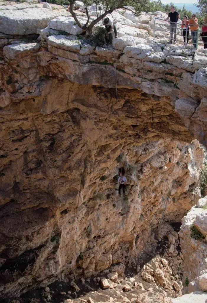 Rappelling in Keshet Cave